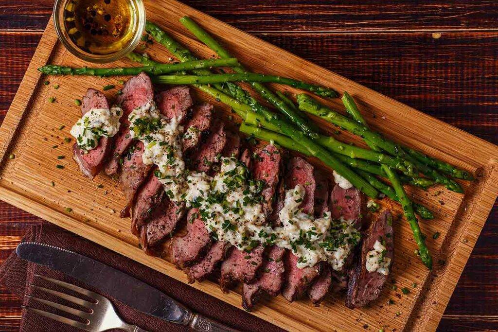 Beef tenderloin steaks with blue cheese topping