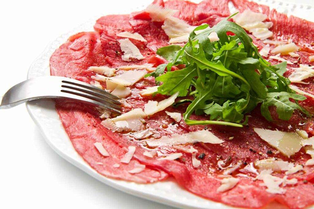 herbs flavoured beef cooked on a parisian cobblestone