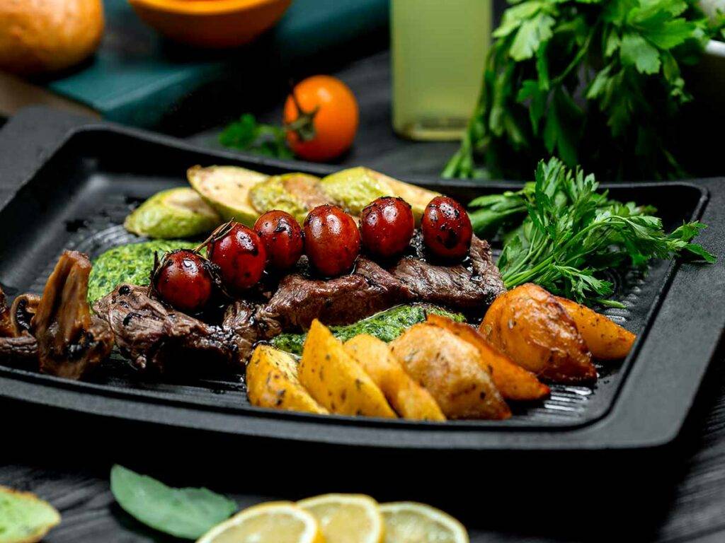 Lemon-Pepper Seasoned Ribeye Filets with Roasted Tomatoes