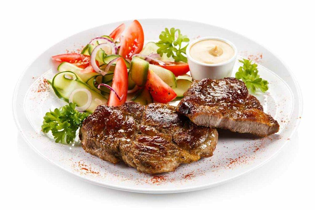 parmesan crusted beef steaks with mediterranean relish