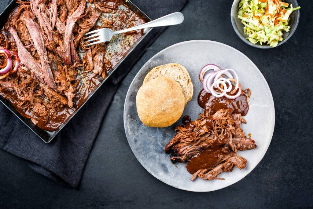 traditional barbecue pulled beef with bbq sauce
